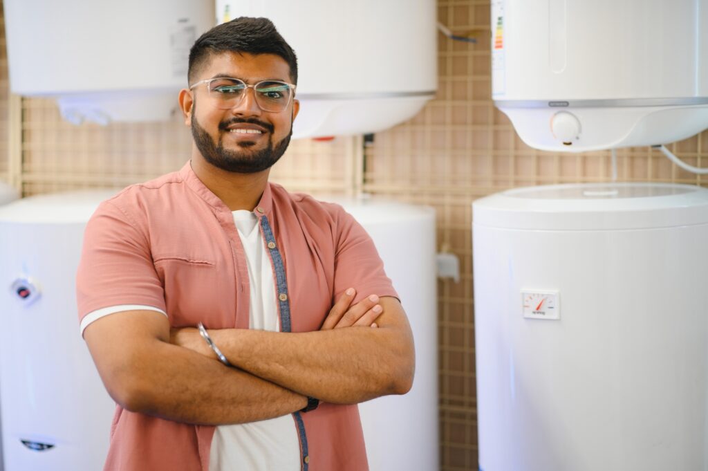 Indian Plumber with boilers, plumbering store.